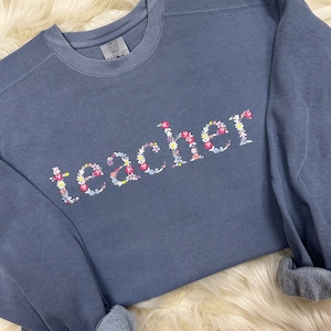 Comfort Colors Teacher Embroidered Floral Sweatshirt | Simple Teach Pullover, Gift for Back to School, Personalized Blue Multicolored