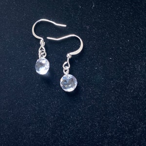 Swarovski crystal dangling earrings. Prism snowflake drop earrings