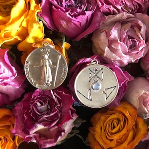 Exalted Venus Talisman for love, benevolence and artistry. Double sided with seals and gem on back. Comes with consecration instructions.
