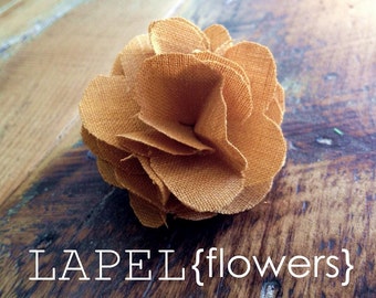 lapel flower in mustard linen