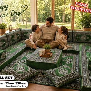 May include: A U-shaped floor seating set featuring green cushions with intricate black and white geometric patterns. The set includes backrests, floor pillows, and a central square ottoman. Text on the image reads Happy Father's Day and U FULL SET.