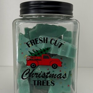 Pot sur le thème de Noël rempli de fonte de cire pour sapin de Noël