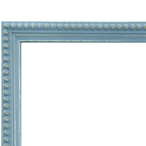 May include: A light blue picture frame with a decorative gold bead border.