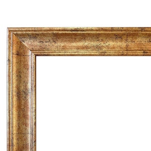 May include: A gold-toned picture frame with a distressed finish. The frame has a wide, ornate border.