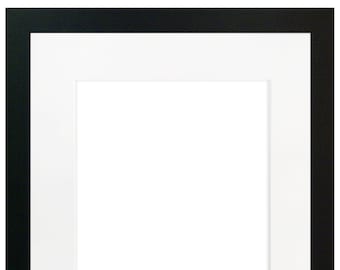 May include: A black picture frame with a white mat.