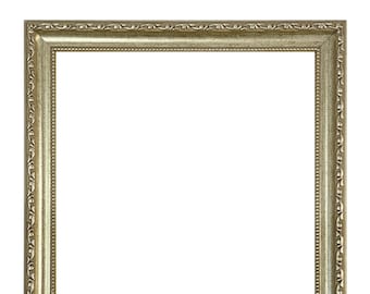 May include: A silver picture frame with an ornate design. The frame is made of wood and has a smooth, polished finish.