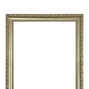 May include: A silver picture frame with an ornate design. The frame is made of wood and has a smooth, polished finish.