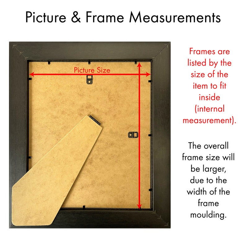 May include: A black picture frame with a brown mount and the text "Picture Size" printed on the mount. The frame is shown from the back, with the backing board removed, and the frame is measured with red lines.