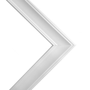 May include: White picture frame with a simple, clean design. The frame has a beveled edge and a smooth finish.