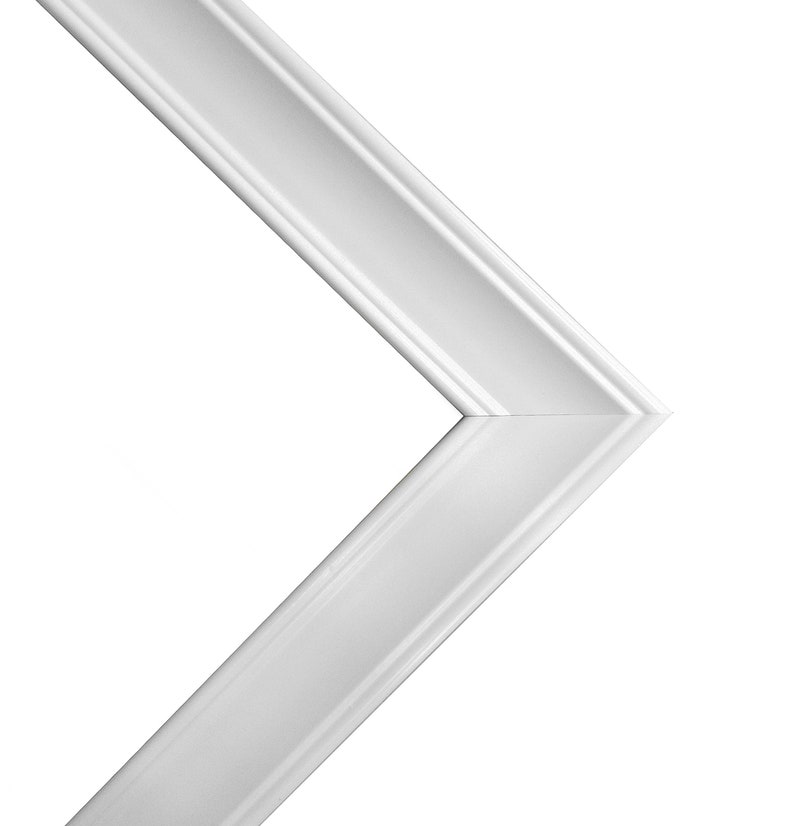 May include: White picture frame with a simple, clean design. The frame has a beveled edge and a smooth finish.