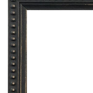 May include: Black picture frame with a decorative beaded edge. The frame is made of wood and has a distressed finish.
