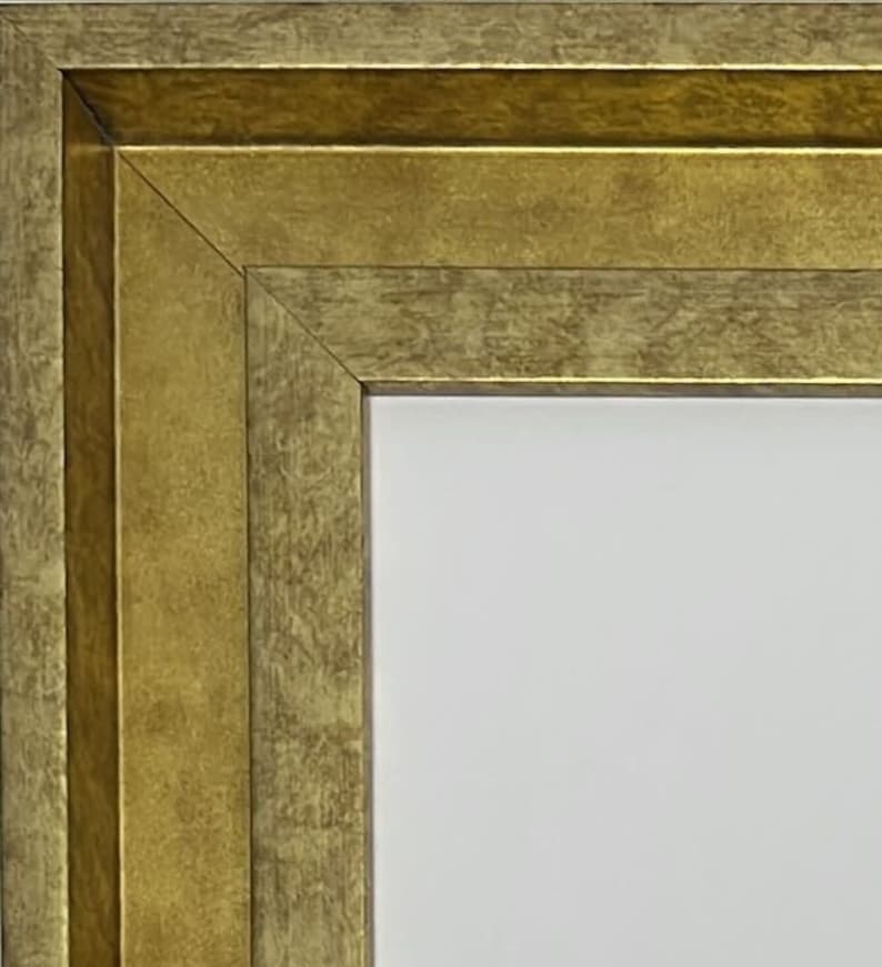 K&ouml;nnte beinhalten: Nahaufnahme der Ecke eines goldenen Bilderrahmens mit einer strukturierten Oberfl&auml;che.