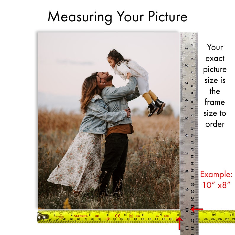 May include: A family of three poses for a photo in a field. A ruler is placed next to the image to show the exact size of the photo. The text "Your exact picture size is the frame size to order" is written next to the ruler. The text "Example: 10" x 8" " is written below the ruler.