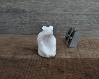 Simple porcelain sitting bear (slightly flawed)