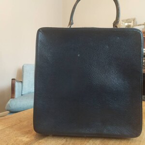 Navy leather overnight bag or bookbag