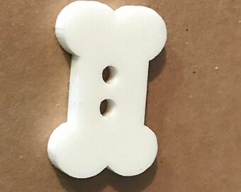 A 10 pack 1 Paintable Black Acrylic Dog Bone Buttons with 2 Holes