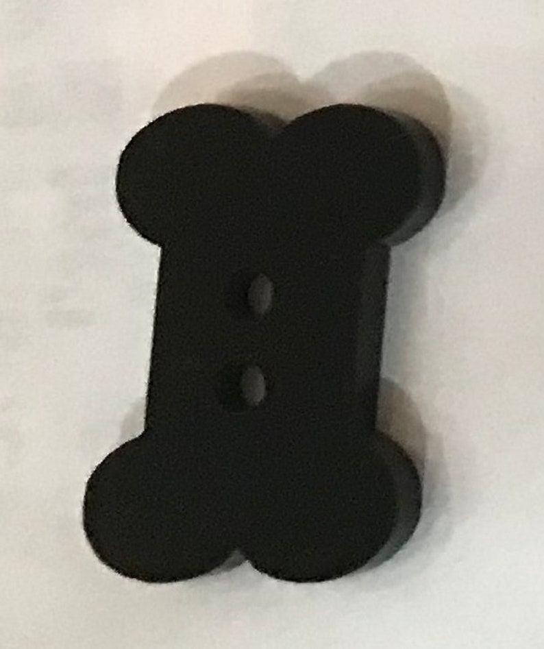 A 10 pack 1 Paintable Black Acrylic Dog Bone Buttons with 2 Holes