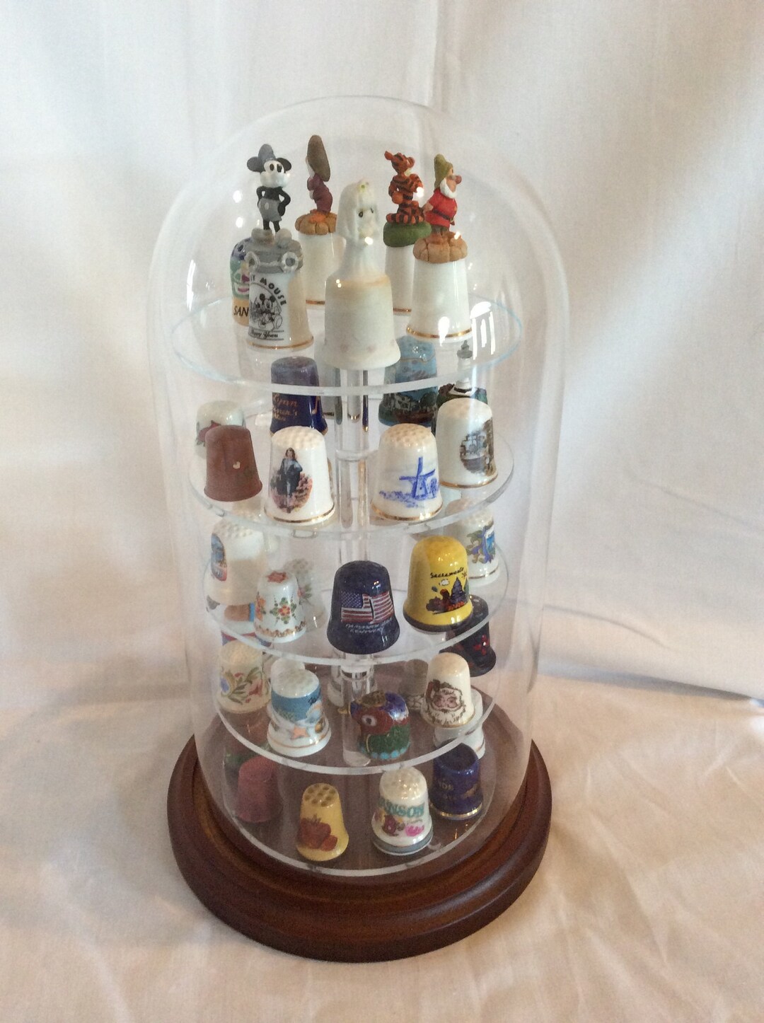 A 5.5x13 Glass Dome With Acrylic Five Tier 45 Thimble Holder Insert