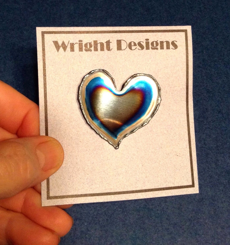 Your chrome plated heart brooch