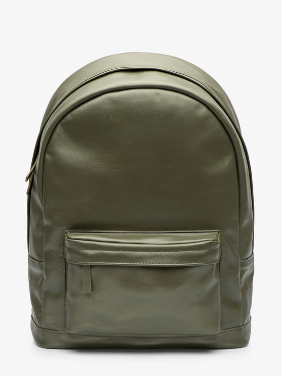green leather rucksack