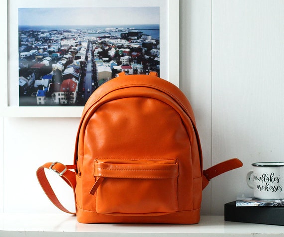orange leather backpack