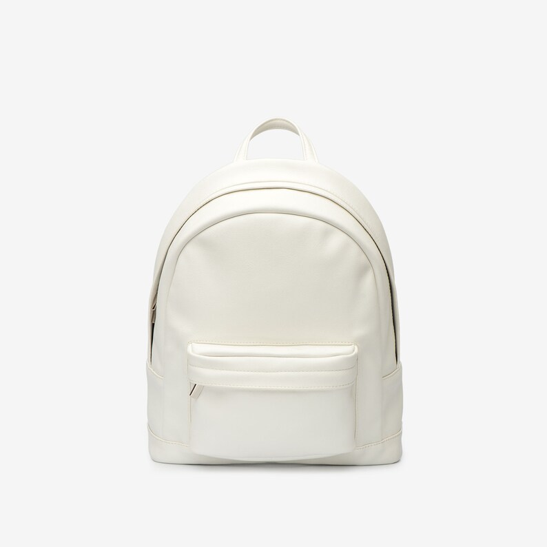 small white backpack