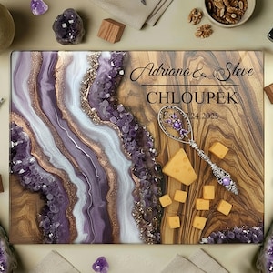 May include: A rectangular wooden cutting board with a decorative amethyst and gold resin design. The board is personalized with the names "Adriana & Steve" and the date "Est. 24.2025". Includes a cheese knife and cheese cubes.