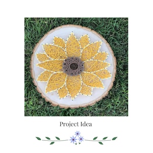 May include: A handcrafted sunflower string art piece. The sunflower is made with yellow string on a round wooden base. The center is brown, and the petals are yellow. The text "Project Idea" is below the sunflower.