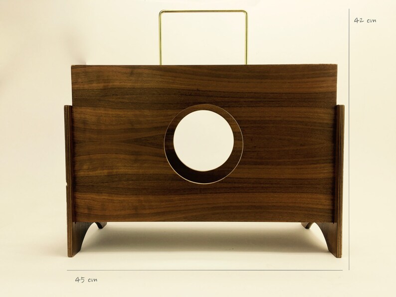 May include: A dark brown wooden box with a circular mirror and a gold-colored handle. The box is 45 cm wide and 42 cm tall (approximately 17.7 inches wide and 16.5 inches tall). The design features a minimalist aesthetic.
