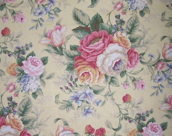 May include: A yellow floral fabric with a repeating pattern of pink, white, and yellow roses, tulips, and other flowers. The fabric has a vintage feel and would be perfect for crafting projects.