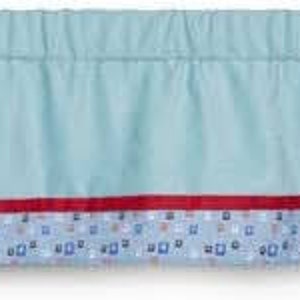 May include: A light blue valance with a red and white patterned border. The valance has a gathered ruffle at the top.