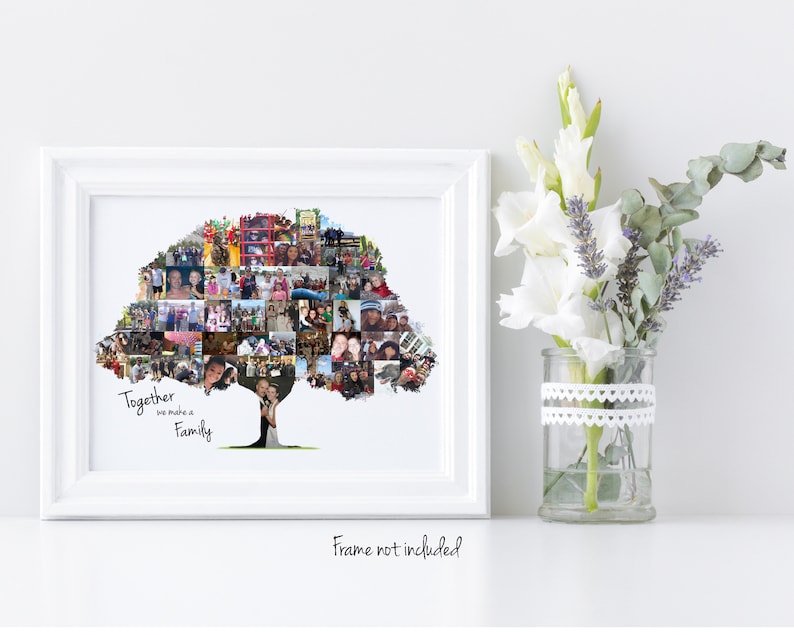 A family tree-shaped photo collage in a white frame with the words "Together we make a Family" displayed next to a vase of white flowers. Frame not included.