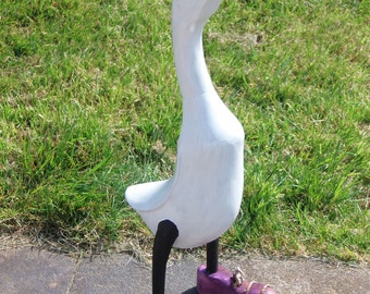 White painted duck with shoes