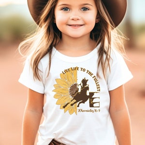 YOUTH Kelsey Mae Memorial Barrel Race 2023 Sunflower with Barrel Racer Unisex Short Sleeve Tee LL2F Barrel Race Shirt 2 Chronicles 16:9