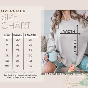 May include: Size chart for an oversized sweatshirt, showing width and length measurements in inches. The chart shows sizes S through 3XL, with corresponding width and length measurements. The text "GILDAN 18000 SWEATER" is visible at the bottom of the chart.