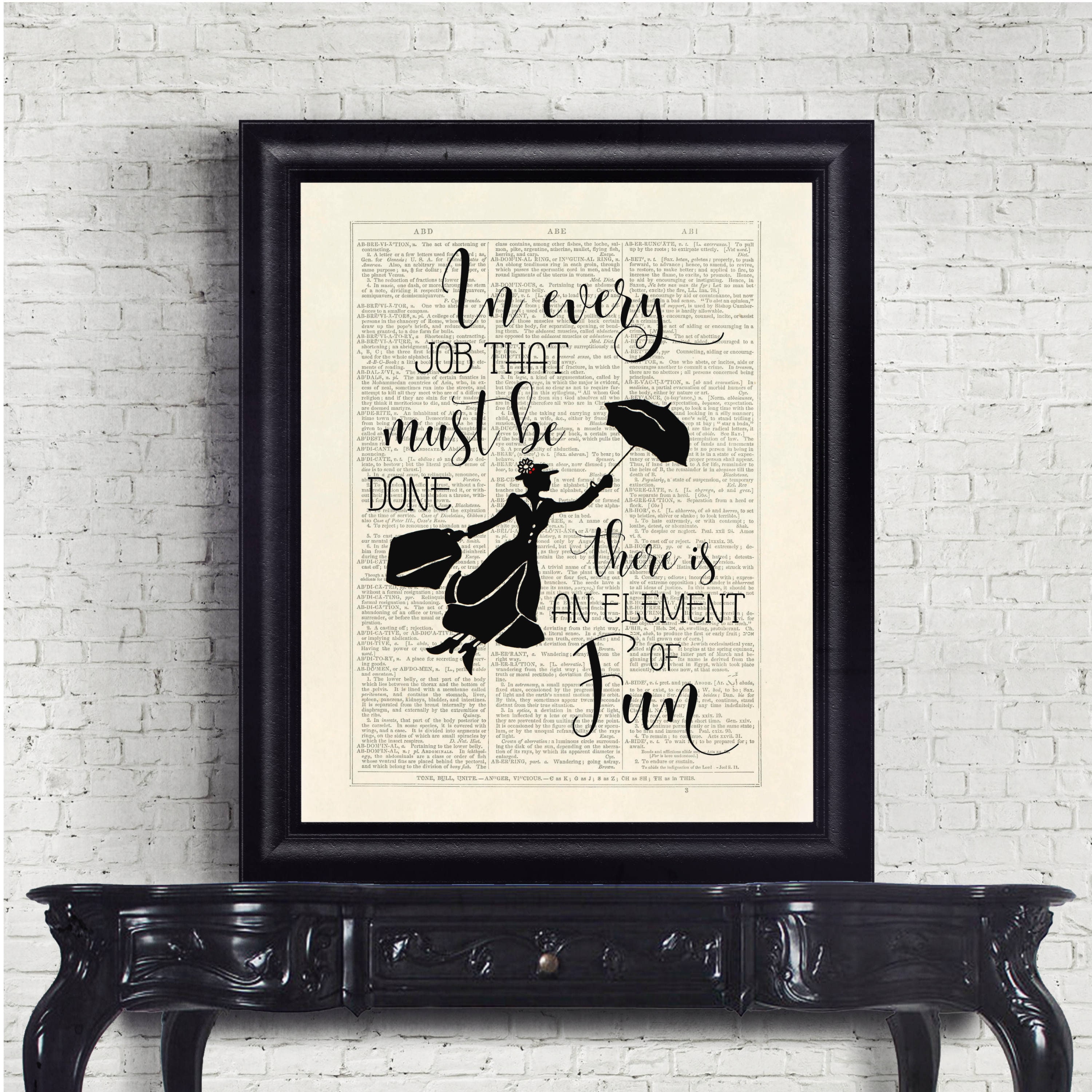 framed marry poppins quote over news print