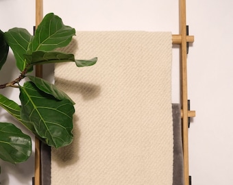 Escalera arrojadiza con colmillos