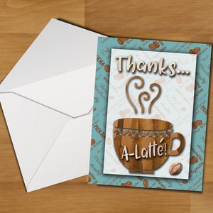 以下が含まれることがあります： コーヒー豆柄の青い背景に、蒸気が出ている茶色のコーヒーカップと「ありがとう... A-Latte!」の文字が書かれた、感謝の気持ちを伝えるカードです。