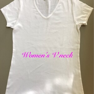 May include: White V-neck t-shirt with short sleeves.