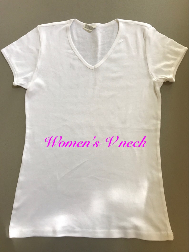 May include: White V-neck t-shirt with short sleeves.
