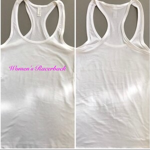 May include: White racerback tank top with the text "Women's Racerback" printed in pink on the front.