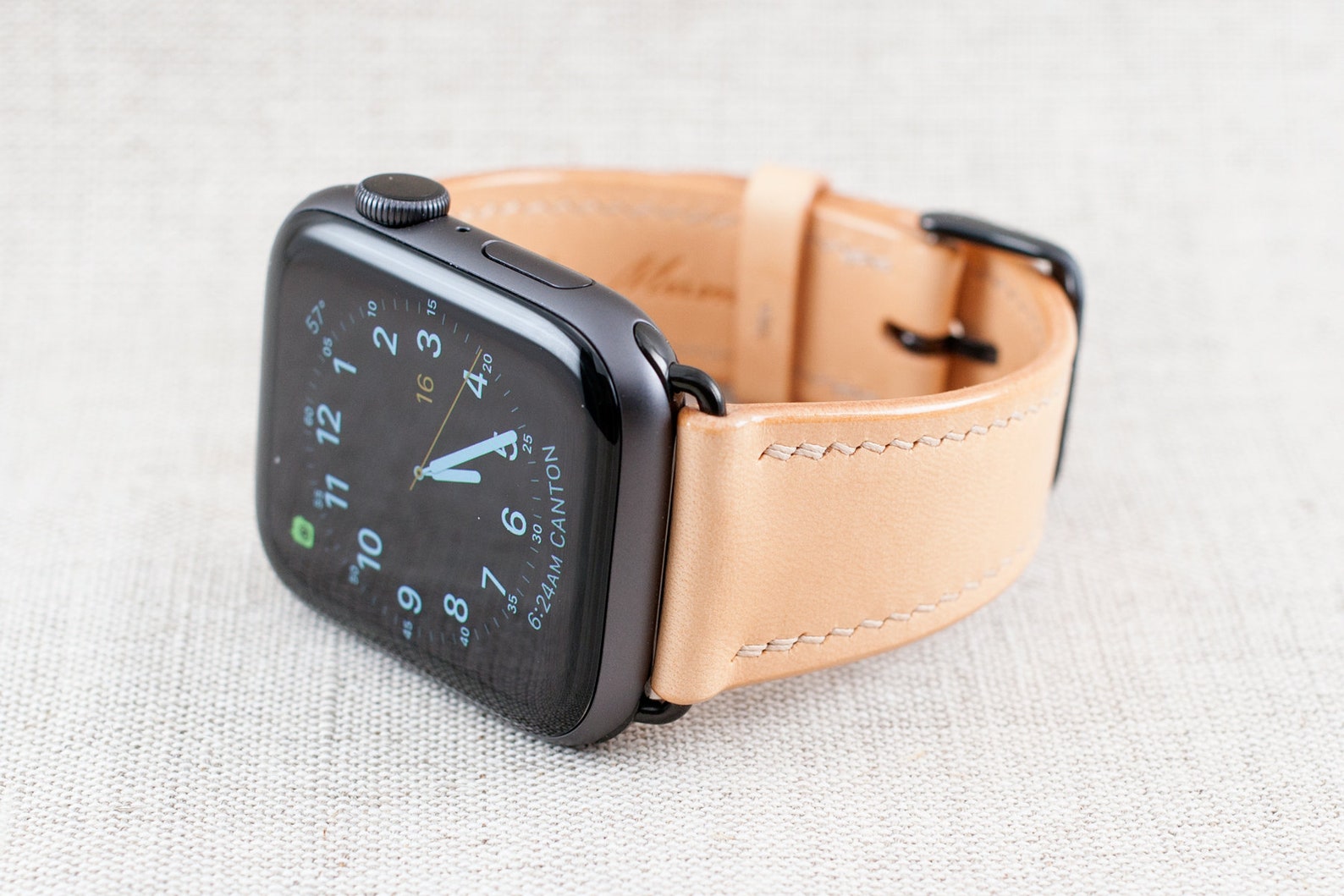 A smart watch with a leather band