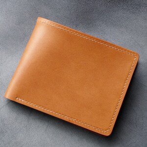 Cartera de hombre plegable en piel de buttero italiana color whisky imagen 2