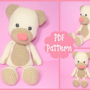 May include: Crochet pattern for a beige and brown amigurumi dog. The pattern is available as a PDF download. The image shows the finished amigurumi dog sitting with its legs crossed.