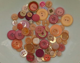 Lot of buttons in various vintage pink colors