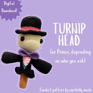 May include: A crochet doll featuring a beige head, a black top hat with a pink band, a purple bow tie, and a black tailcoat over a pink and teal vest. The text reads: Digital Download! TURNIP HEAD (or Prince, depending on who you ask) Crochet pattern by morbidly made.