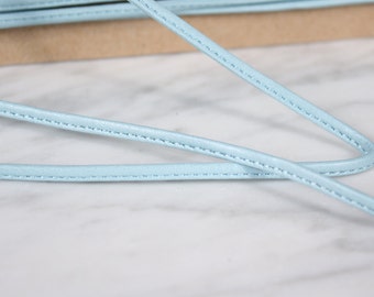 7.5 m of 4mm, polyurethane, pale blue ribbon, (1255)