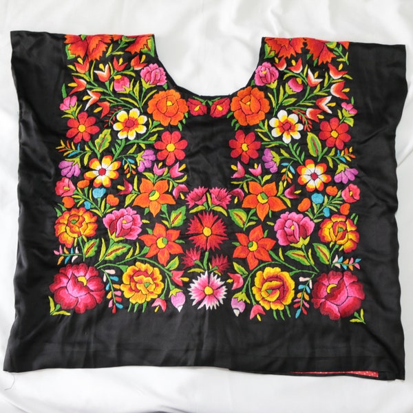 Vintage Mexican hand-embroidered huipil: embroidered flowers on angel skin