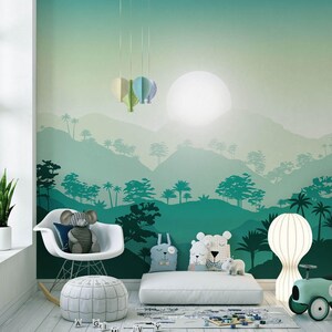 May include: A child's room with a jungle-themed mural in shades of teal and green. A white rocking chair, a pouf, and decorative pillows are in the foreground. A toy car and a modern lamp add to the decor. The room has a large window and hanging paper lanterns.