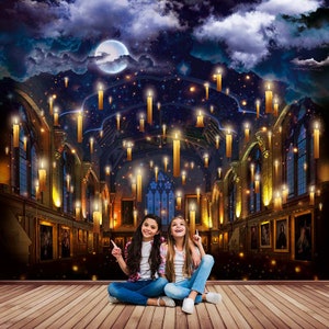 May include: Two young girls sit on a wooden floor, pointing upwards at a fantasy scene. The backdrop features a grand hall with floating candles, a starry night sky, and a full moon. The scene evokes a magical, whimsical atmosphere.